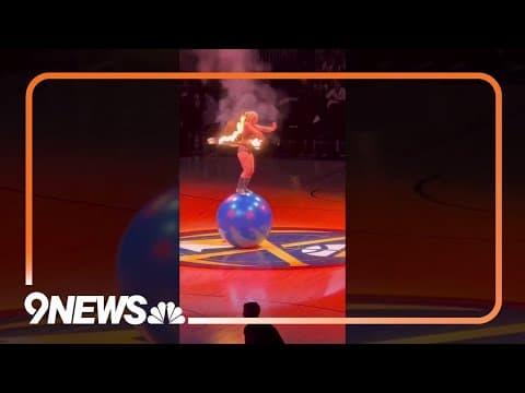 Grace Good performs hula hoop, fire and acrobatic act at Denver Nuggets/LA Lakers playoff game