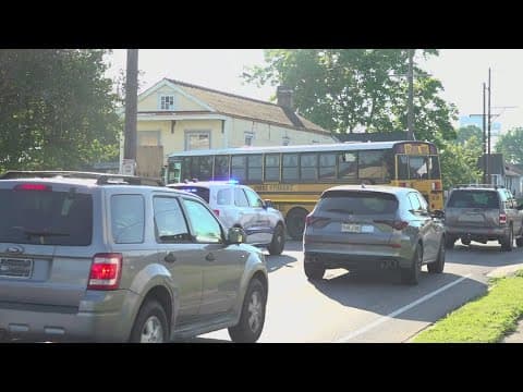 Children and driver injured after car crashes into school bus in New Orleans