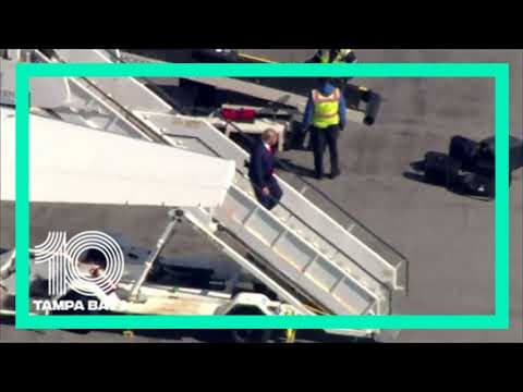 Trump's plane lands in New York ahead of the former president's expected arraignment