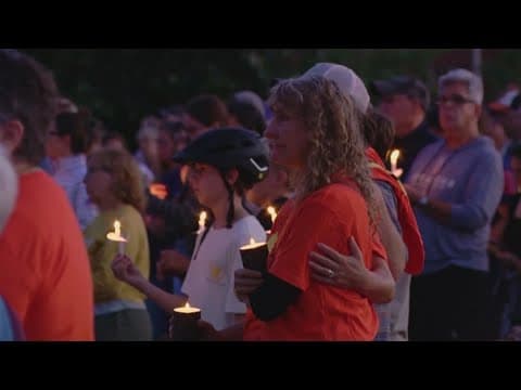 Families mourn after two children were shot and killed in a Minnesota Catholic School