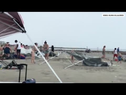 Galveston waterspout collapses tents, sends beach items flying