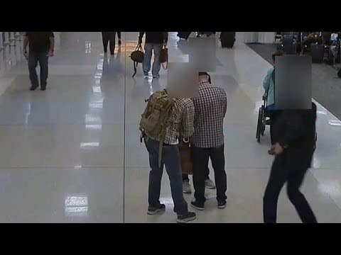 Video shows airport arrest of Columbus police officer charged in federal drug case