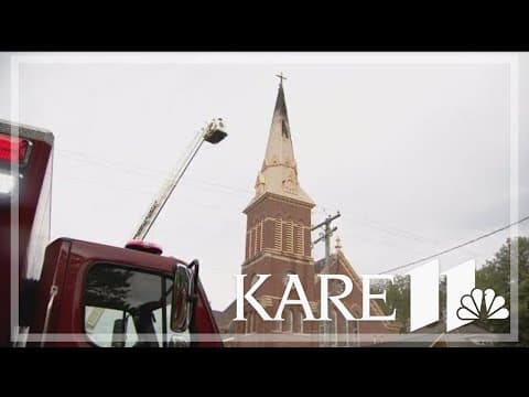 Volunteer firefighters battle blaze that damaged 2 homes and 121-year-old church