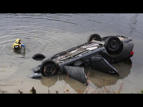 2 injured after car found in north Indianapolis retention pond