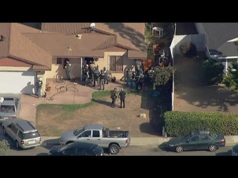 Wanted fugitive surrenders peacefully after prompting SWAT standoff in San Diego neighborhood