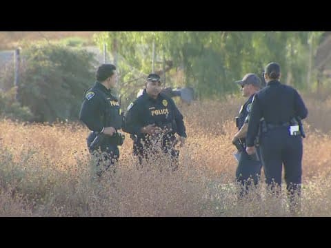 San Diego Police investigate decomposed body found in field