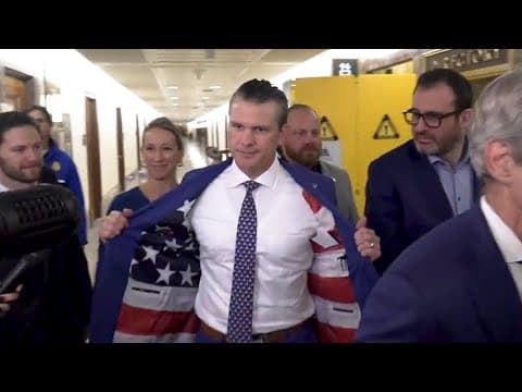 Pete Hegseth shows off American flag lined suit jacket at Capitol Hill