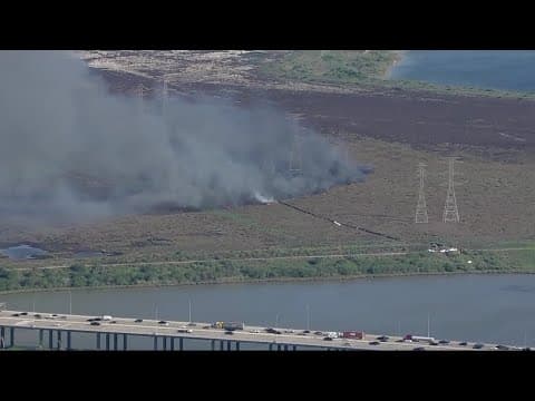 Air 11 over grass fire in La Porte