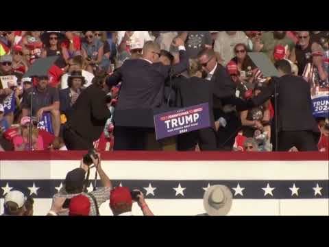 Donald Trump rushed off stage at Pennsylvania rally after apparent gunshots rang through the crowd