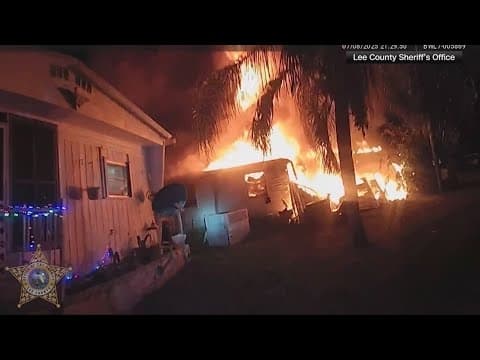 Body camera footage from Florida shows deputies rescue elderly couple from mobile home fire