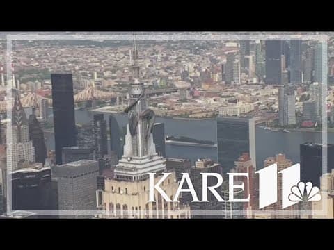 Giant dragon sits atop Empire State Building