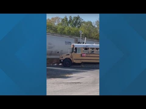 Video shows moments a train nearly hits a Columbus school bus