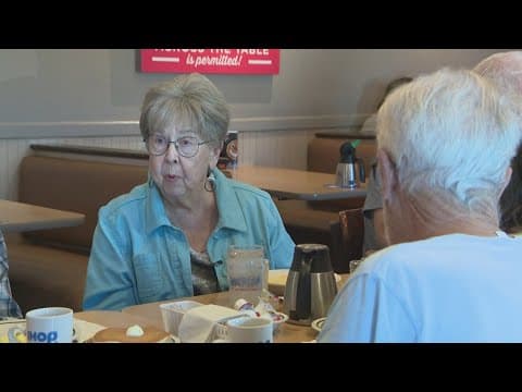 A group of neighbors goes above and beyond to help a beloved server