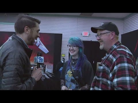 Metallica fans brave rain for show, Metro extends hours