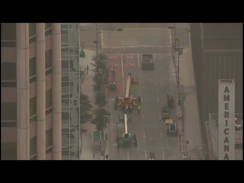 Downtown Houston storm damage cleanup continues