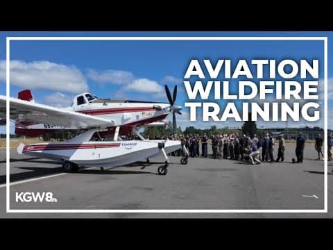 Firefighters practice communicating with water tanker planes during wildfires