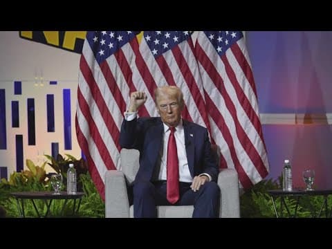 Donald Trump speaks in front of journalists at NABJ in Chicago