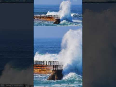Strong waves and high surf damaged Children's Pool La Jolla sea wall and knocked down railings