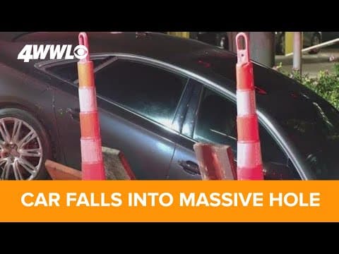 Car swallowed by massive hole in New Orleans street