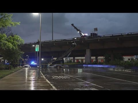 Dallas weather: 18-wheeler hanging off bridge in downtown Dallas