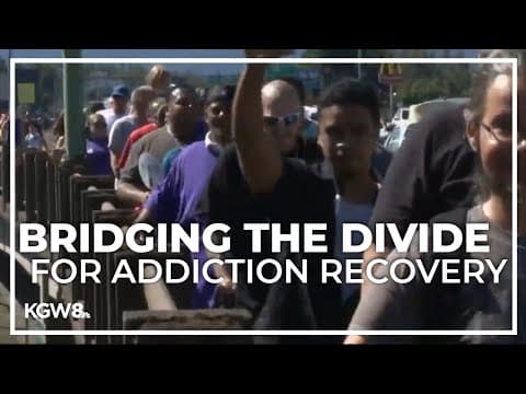 Hundreds march on I-5 Bridge to support people recovering from addiction