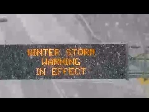 Traffic cameras show snow coming down in Florida