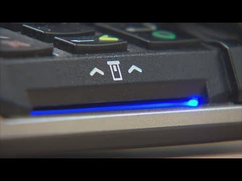 2 people arrested for allegedly placing skimming device in Newark store