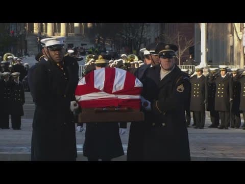 Jimmy Carter's body transferred from hearse at U.S. Navy Memorial in DC