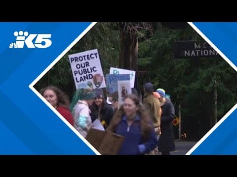 Demonstrators at Mount Rainier rally to protect national parks, federal workers
