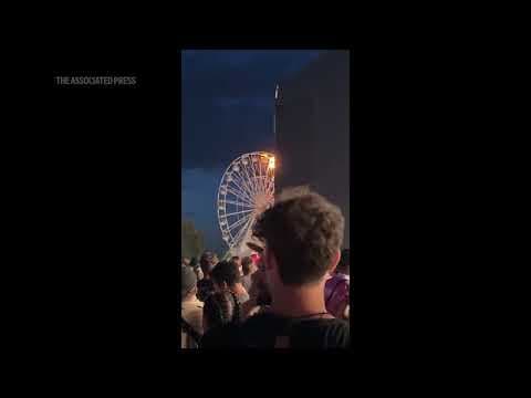 More than 20 injured after two gondolas on Leipzig ferris wheel catch fire