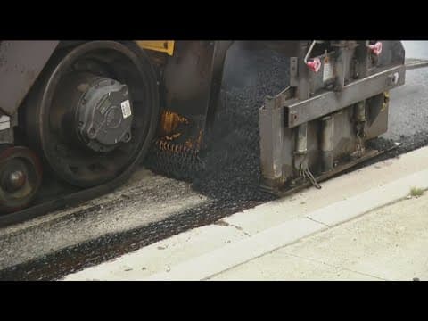 Repair work is underway on Serra Mesa Road notorious for potholes