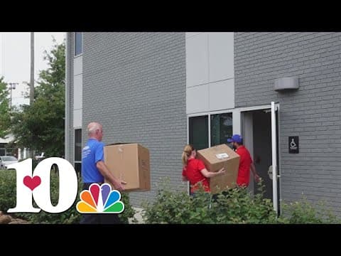 Volunteers help prepare boxes of shoes for annual 'Shoes for School' event