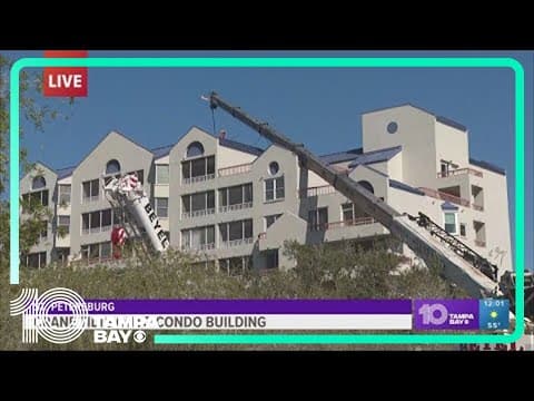 Crane tips over onto roof of condo building in St Pete