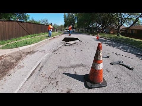 Truck gets stuck in sinkhole on Dallas road after wastewater pipe breaks
