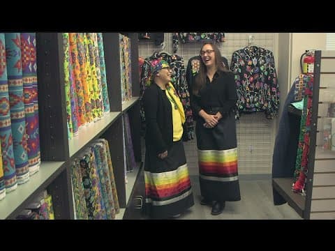 Native women open fabric store with materials for traditional clothing