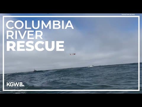 Men seen hanging onto capsized boat on Columbia River