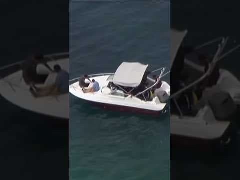 Authorities detained 14 men who were found on a disabled boat off the coast of Solana Beach. #news