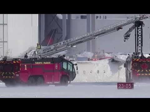 Toronto plane crash: Photos of Delta jet upside down