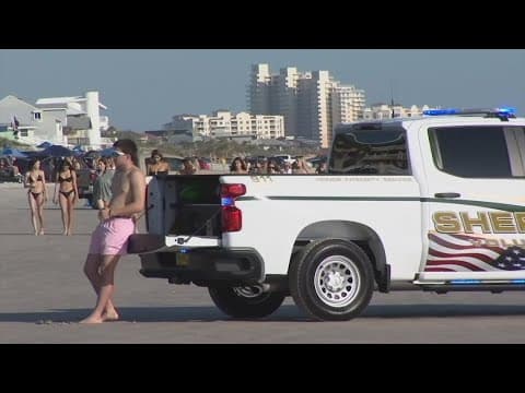 Surfer bitten by a shark at New Smyrna Beach