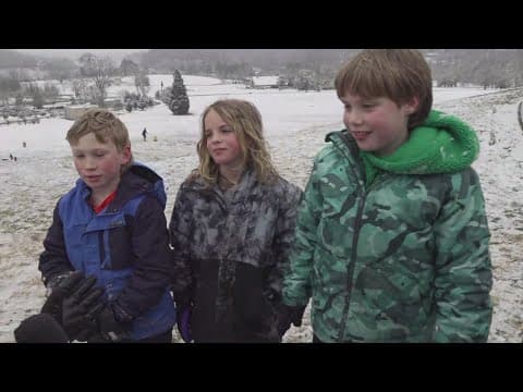 Shea Smith meets some sledders at Lakeshore Park