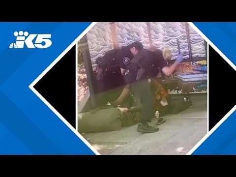 EXCLUSIVE: Video shows Seattle police officers beating man with batons at bus stop