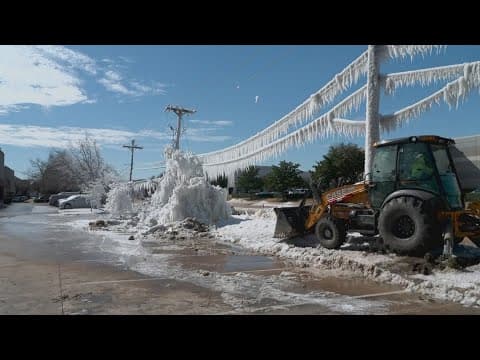 Carrollton water line bursts, leaving frozen water and knocking out service to nearby residents
