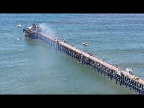 Drone video captures Oceanside Pier one day after fire