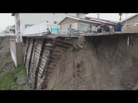 Saturated ground from rain creates sinkholes, potholes and mudslides across the county