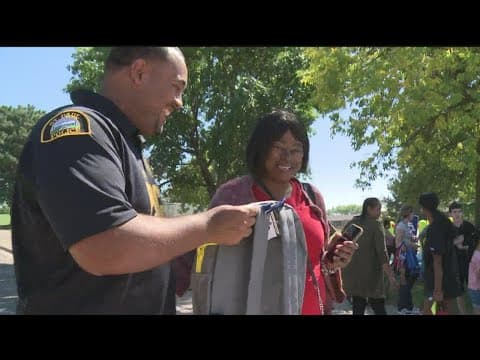 National Black Police Association hosts 'Backpacks & Barbers'