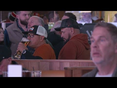 Snow, sleet or rain isn't stopping these fans from getting to the Cotton Bowl