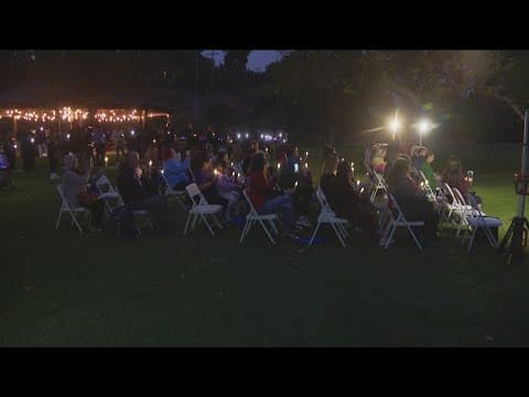 Candlelight vigil held to honor victims during Domestic Violence Awareness Month