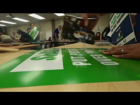 Sharp nurses make signs ahead of informational picket on Wednesday