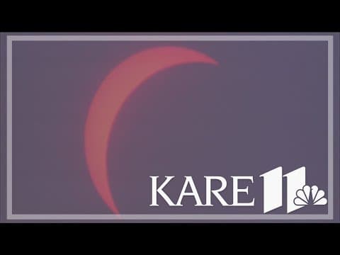 Clouds put damper on eclipse excitement, but southern Minnesotans still persevere