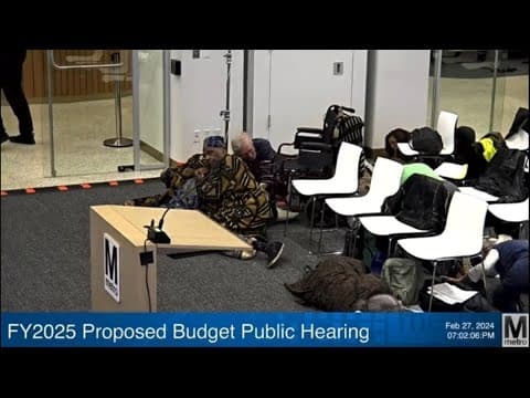 Metro hearing attendees drop to ground after truck cable hits window is mistaken for gunshot